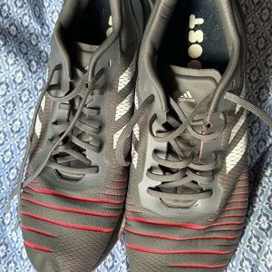 Size 14 Men’s Adidas shoes. Used. Worn condition. No rips or tears.